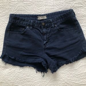 Navy blue denim shorts by Free People